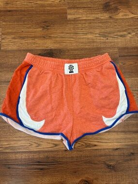 Nike Women's Orange Athletic Shorts with Blue Trim and White Swoosh sz: Large